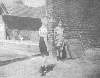 German children in a farmyard just before Operation Varsity.